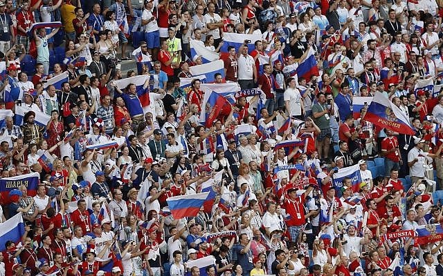Russia soccer fans cheer for their team ahead the group A match between Uruguay and Russia at the 2018 soccer World Cup at the Samara Arena in Samara, Russia, Monday, June 25, 2018. (AP/Efrem Lukatsky) Russia soccer fans cheer for their team ahead the group A match between Uruguay and Russia at the 2018 soccer World Cup at the Samara Arena in Samara, Russia, Monday, June 25, 2018. (AP/Efrem Lukatsky)