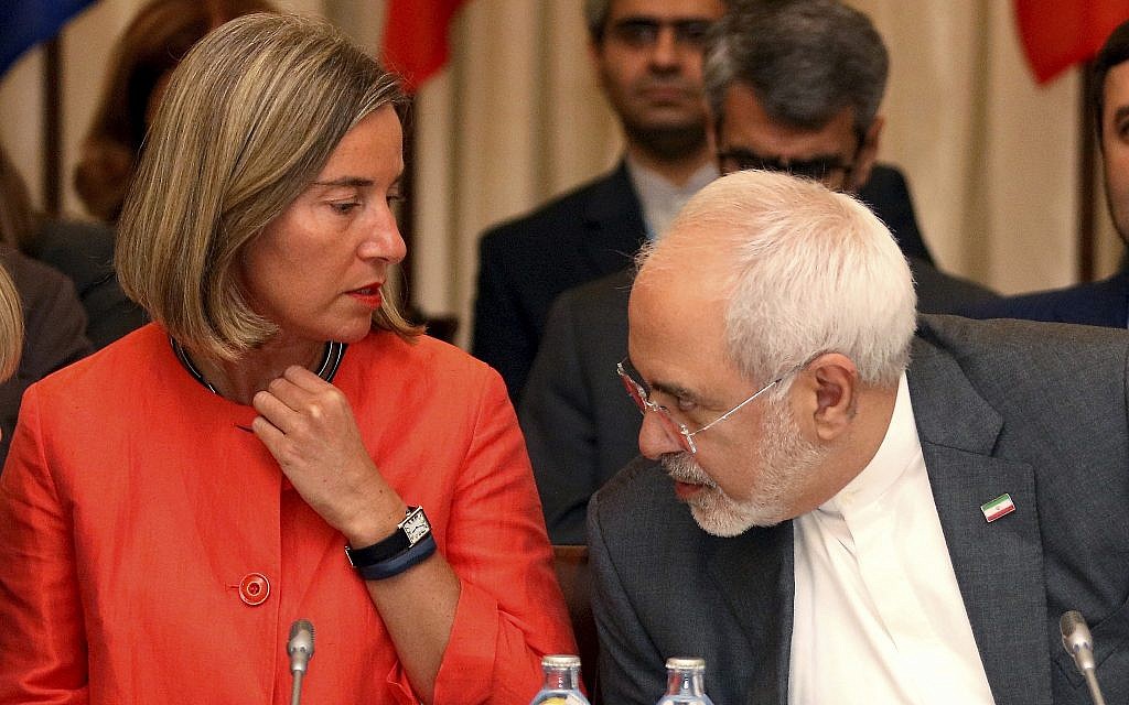 European Union High Representative for Foreign Affairs Federica Mogherini and Iranian Foreign Minister Mohammad Javad Zarif, from left, wait for the start of prior to a bilateral meeting as part of the closed-door nuclear talks with Iran at a hotel in Vienna, Austria, on July 6, 2018. (AP Photo/Ronald Zak) European Union High Representative for Foreign Affairs Federica Mogherini and Iranian Foreign Minister Mohammad Javad Zarif, from left, wait for the start of prior to a bilateral meeting as part of the closed-door nuclear talks with Iran at a hotel in Vienna, Austria, on July 6, 2018. (AP Photo/Ronald Zak)