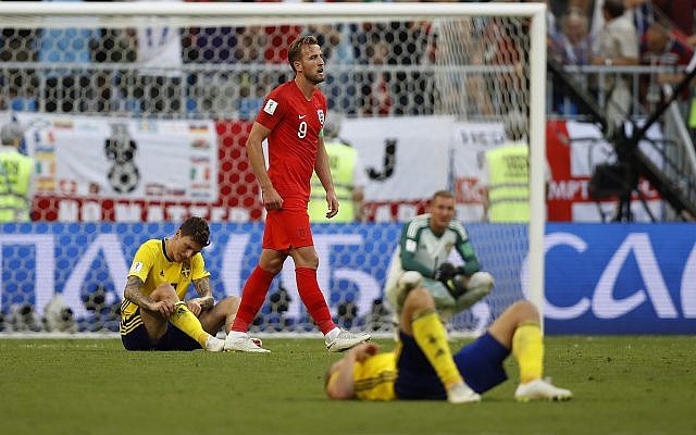 England's Harry Kane walks past Sweden's players at the end of the match after his team beat Sweden 2-0 in the quarterfinal match between Sweden and England at the 2018 soccer World Cup in the Samara Arena, in Samara, Russia, Saturday, July 7, 2018. (AP Photo/Francisco Seco) England's Harry Kane walks past Sweden's players at the end of the match after his team beat Sweden 2-0 in the quarterfinal match between Sweden and England at the 2018 soccer World Cup in the Samara Arena, in Samara, Russia, Saturday, July 7, 2018. (AP Photo/Francisco Seco)