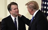 US President Donald Trump (right) greets Judge Brett Kavanaugh, his Supreme Court nominee, in the East Room of the White House, July 9, 2018, in Washington. (AP Photo/Evan Vucci)