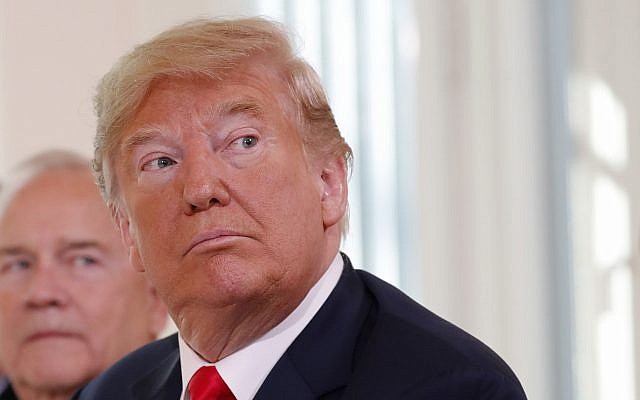 US President Donald Trump attends a working breakfast in Helsinki, Finland, July 16, 2018 (Pablo Martinez Monsivais/AP)