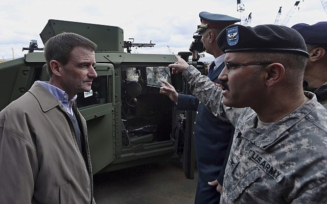 Then US Ambassador to Lebanon David Hale, left, speaks with a US Army soldier during a handover ceremony of US weapons to the Lebanese army at Beirut's port in Lebanon on Sunday, Feb. 8, 2015. (AP Photo/Bilal Hussein) Then US Ambassador to Lebanon David Hale, left, speaks with a US Army soldier during a handover ceremony of US weapons to the Lebanese army at Beirut's port in Lebanon on Sunday, Feb. 8, 2015. (AP Photo/Bilal Hussein)