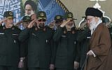 Supreme Leader Ayatollah Ali Khamenei, right, arrives at a graduation ceremony of the Revolutionary Guard's officers, while deputy commander of the Revolutionary Guard, Hossein Salami, second right, former commanders of the Revolutionary Guard Mohsen Rezaei, second left, and Yahya Rahim Safavi salute him, on May 20, 2015,  in Tehran, Iran. (Official website of the Office of the Iranian Supreme Leader via AP)