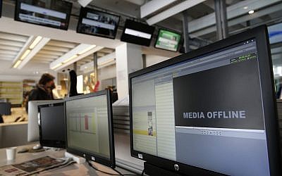 Illustrative image of 'offline' computer screens. (AP Photo/Christophe Ena)