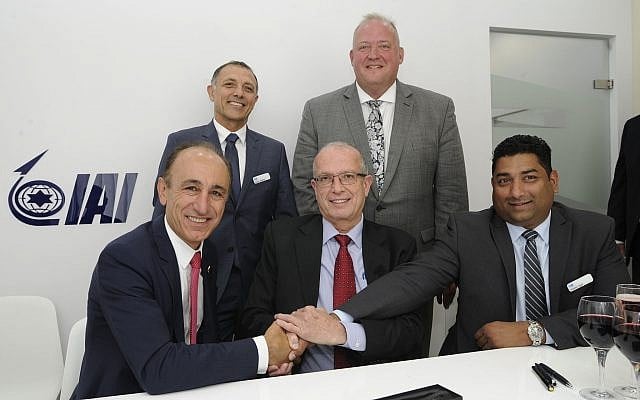 First row, left to right: Faith Ozmen, CEO & owner of SNC, Josef Weiss, IAI's CEO, Swami Iyer, CEO of IAI North America.
Second row, left to right: Shaul Shahar, executive vice president & general manager of IAI’s Military Aircraft Group, Tim Owings, executive vice president of SNC’s Integrated Mission Systems business area (Courtesy) First row, left to right: Faith Ozmen, CEO & owner of SNC, Josef Weiss, IAI's CEO, Swami Iyer, CEO of IAI North America.
Second row, left to right: Shaul Shahar, executive vice president & general manager of IAI’s Military Aircraft Group, Tim Owings, executive vice president of SNC’s Integrated Mission Systems business area (Courtesy)