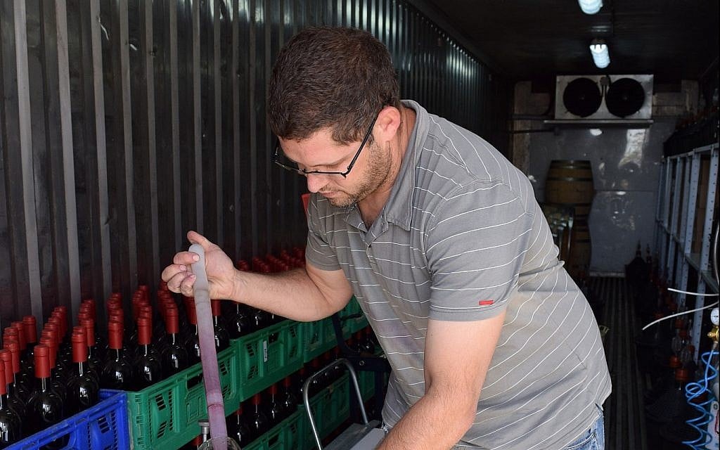 A student makes wine at Ariel University. (Courtesy) A student makes wine at Ariel University. (Courtesy)