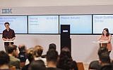 IBM's Project Debater, center, arguing for genetic engineering against professional debater Hayah Goldlist-Eichler (right) with Yaar Bach (left) moderating; July 3, 2018 (Or Kaplan)