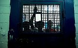 Illustrative: Young boys from Eritrea seen at the Givon Prison, near Ramle, in 2010. (Moshe Shai/Flash90)