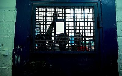 Illustrative: Young boys from Eritrea seen at the Givon Prison, near Ramle, in 2010. (Moshe Shai/Flash90)