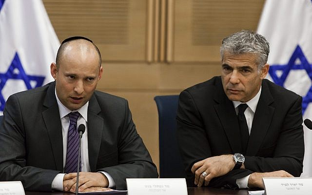 Yesh Atid chairman Yair Lapid (R) and Jewish Home head Naftali Bennett present an agreement reached between Israel's technological colleges and the Finance Ministry, at the Knesset, on October 27, 2013. (Flash90) Yesh Atid chairman Yair Lapid (R) and Jewish Home head Naftali Bennett present an agreement reached between Israel's technological colleges and the Finance Ministry, at the Knesset, on October 27, 2013. (Flash90)
