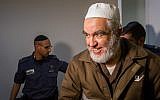 Sheikh Raed Salah, leader of the Northern Branch of the Islamic Movement in Israel, arrives for a hearing at the Haifa Magistrate's Court on February 26, 2018. (Flash90)