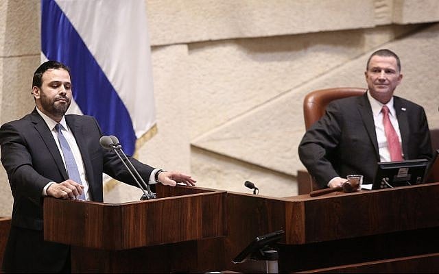 Shas party MK Yinon Azoulay (left) speaks at the Knesset, as Speaker Yuli Edelstein looks on. (Yonatan Sindel/Flash90) Shas party MK Yinon Azoulay (left) speaks at the Knesset, as Speaker Yuli Edelstein looks on. (Yonatan Sindel/Flash90)