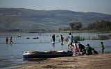 Illustrative photo of Israelis enjoying the beaches of the Sea of Galilee, northern Israel, on April 1, 2018. (Hadas Parush/Flash90)