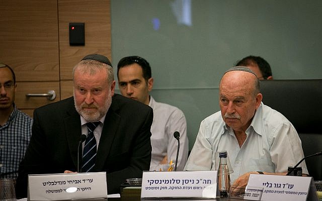 Nissan Slomiansky (r), head of the Constitution, Law, and Justice, Committee and Attorney General Avichai Mandelblit in the Knesset on June 25, 2018. (Yonatan Sindel/ Flash90) Nissan Slomiansky (r), head of the Constitution, Law, and Justice, Committee and Attorney General Avichai Mandelblit in the Knesset on June 25, 2018. (Yonatan Sindel/ Flash90)