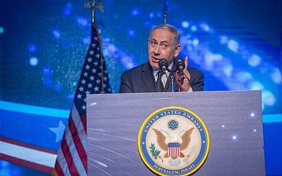 Prime Minister Benjamin Netanyahu speaks during an American Independence Day celebration in Airport City on July 3, 2018. (Miriam Alster/Flash90)