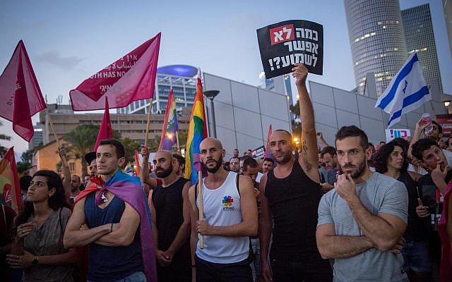 Demonstrators protest against a Knesset bill amendment denying surrogacy for same-sex couples, Tel Aviv, July 14, 2018 (Miriam Alster/Flash90) Demonstrators protest against a Knesset bill amendment denying surrogacy for same-sex couples, Tel Aviv, July 14, 2018 (Miriam Alster/Flash90)