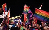 Members of the LGBT community and supporters participate in a protest against a Knesset bill amendment denying surrogacy for same-sex couples, at Rabin Square in Tel Aviv on July 22, 2018. (Miriam Alster/Flash90)