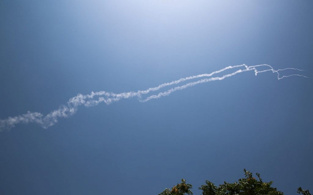 Smoke trails from two Israeli Patriot interceptor missiles that Israel says shot down a Syrian fighter jet are seen in northern Israel on July 24, 2018. (David Cohen/Flash90)