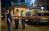 IParamedics and security forces at the scene of a stabbing attack in the West Bank ( Hadas Parush/Flash90)