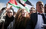 Palestinian teenager Ahed Tamimi (c) is welcomed by relatives and supporters after she was released from Israeli military prison on July 29, 2018. (FLASH90)