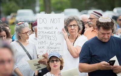 In Burlington Massachusetts, a gathering on Tisha B'Av is held outside the government's ICE offices, July 22, 2018 (Matt Lebovic/The Times of Israel)