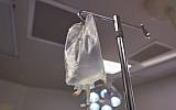 Illustrative image of an IV bag (dimarik; iStock by Getty Images)