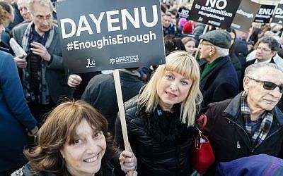 Illustrative: British Board of Deputies head Marie van der Zyl, center with sign, joins demonstrators at a protest against anti-Semitism in British politics at the UK Parliament, March 2018. (Courtesy)