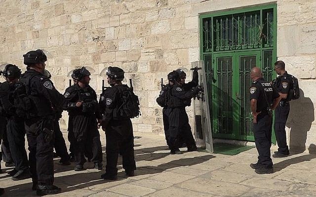 Police are seen outside the Al-Aqsa Mosque during clashes following Friday afternoon prayers at the Temple Mount compound in the Old City of Jerusalem on July 27, 2018. (Police Spokesperson)