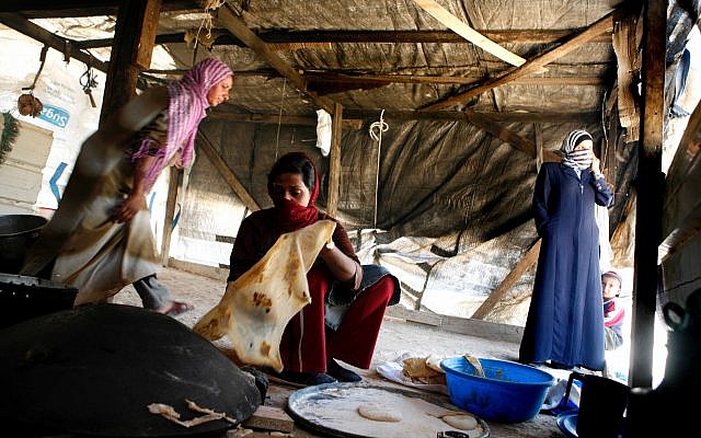 Illustrative image of three Bedouin women making pita on May 9, 2006. (Nati Shohat /Flash90) Illustrative image of three Bedouin women making pita on May 9, 2006. (Nati Shohat /Flash90)