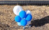 A cluster of balloons launched from the Gaza Strip that landed inside the southern Israel Eshkol region on July 12, 2018. (Eshkol Security)