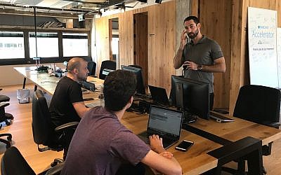 Entrepreneurs at work at Barclay's RISE accelerator in Tel Aviv, June 25, 2018 (Shoshanna Solomon/Times of Israel)