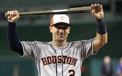 Alex Bregman #2 of the Houston Astros and the American League poses with the MVP trophy after defeating the National League during the 89th MLB All-Star Game, presented by Mastercard at Nationals Park on July 17, 2018, in Washington, DC.  (Patrick Smith/Getty Images via JTA)