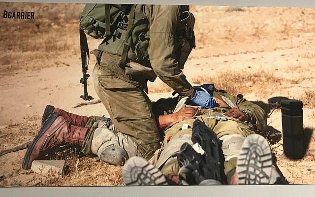 Illustration of a soldier using BCarrier at an exhibition of graduates at the Bezalel Academy of Arts and Design; July 18, 2018 (Ariella Gentin/Times of Israel) Illustration of a soldier using BCarrier at an exhibition of graduates at the Bezalel Academy of Arts and Design; July 18, 2018 (Ariella Gentin/Times of Israel)
