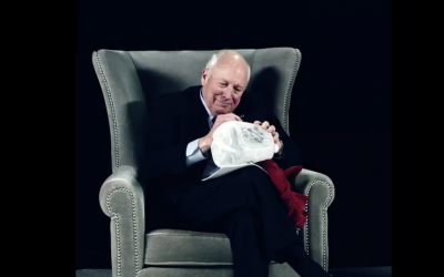 Dick Cheney signs a “waterboard kit,” or jug of water, on Sacha Baron Cohen’s upcoming show. (Twitter)