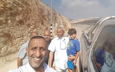 Seven-year-old Arab Israeli Karim Jumhour of Qalansawe (R) is seen following his release after being held in the West Bank by kidnappers, on July 13, 2018. (Israel Police)