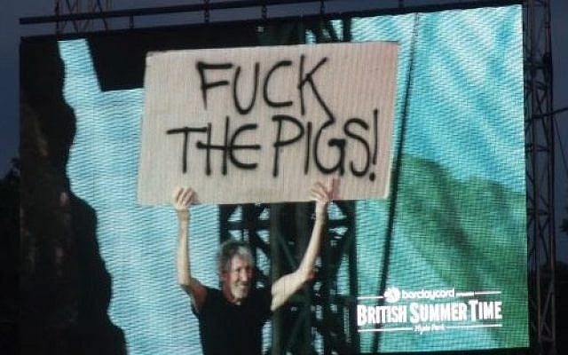 Roger Waters wielding slogan 'F--k the Pigs!' at a concert in London on July 6, 2018. (courtesy Richard Millett} Roger Waters wielding slogan 'F--k the Pigs!' at a concert in London on July 6, 2018. (courtesy Richard Millett}