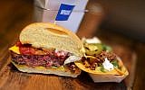 The Impossible Burger is vegetarian, but it bleeds like a normal meat patty. (Jonathan Wiggs/The Boston Globe via Getty Images/JTA)
