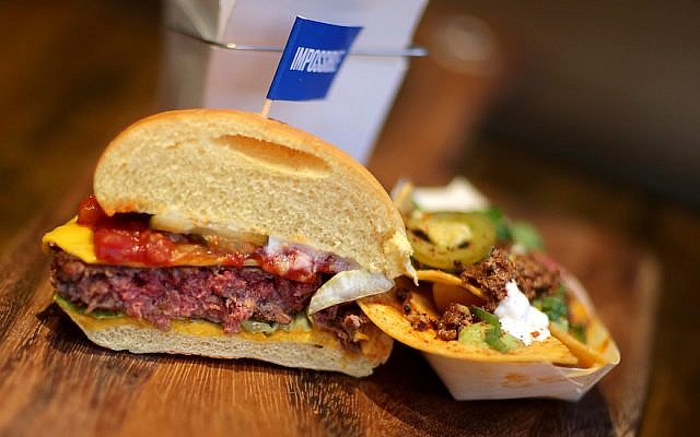 The Impossible Burger is vegetarian, but it bleeds like a normal meat patty. (Jonathan Wiggs/The Boston Globe via Getty Images/JTA) The Impossible Burger is vegetarian, but it bleeds like a normal meat patty. (Jonathan Wiggs/The Boston Globe via Getty Images/JTA)