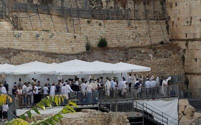 Segregated-gender Orthodox prayer in the Robinson's Arch pluralistic prayer platform at the Western Wall, July 13, 2018. (Courtesy)