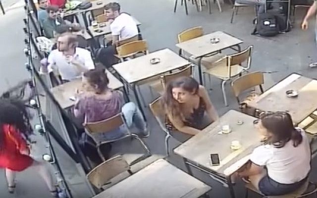 Marie Laguerre, a 22-year-old student is punched by the man who sexually assaulted her in brad daylight outside a cafe on July 25, 2018. (screen capture: YouTube) Marie Laguerre, a 22-year-old student is punched by the man who sexually assaulted her in brad daylight outside a cafe on July 25, 2018. (screen capture: YouTube)