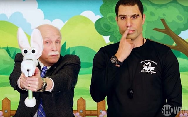 Sacha Baron Cohen in Who Is America?, July 2018 (YouTube screenshot) Sacha Baron Cohen in Who Is America?, July 2018 (YouTube screenshot)