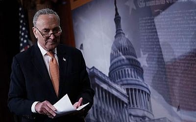 Senate Minority Leader Charles Schumer leaving after a news conference on Capitol Hill in Washington, DC, Jan. 20, 2018. (Alex Wong/Getty Images via JTA)