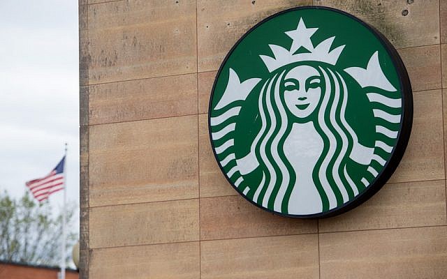 The sign for a Starbucks Coffee shop seen in Washington, DC, April 17, 2018. (SAUL LOEB/AFP/Getty Images via JTA) The sign for a Starbucks Coffee shop seen in Washington, DC, April 17, 2018. (SAUL LOEB/AFP/Getty Images via JTA)