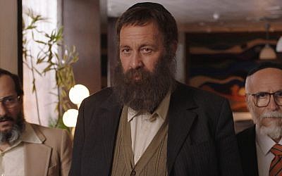 Shuli Rand (center) as Yakov Cohen, and his two fellow, fictionalized Shas-founding partners, in The Unorthodox, which premiered at the Jerusalem Film Festival on July 26, 2018  (courtesy)