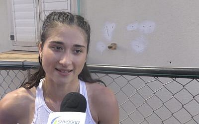 Sprinter Diana Vaisman after she broke the Israeli women's 100 meter record on July 4, 2018. (Screen capture: YouTube)