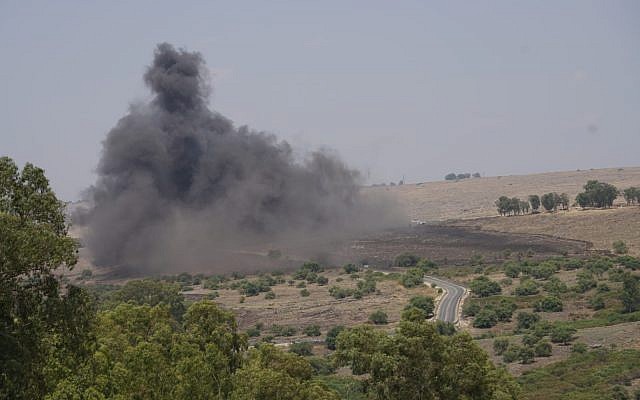 A line of landmines are detonated in a field in the southern Golan Heights as part of a mine clearing effort on July 24, 2018. (Defense Ministry) A line of landmines are detonated in a field in the southern Golan Heights as part of a mine clearing effort on July 24, 2018. (Defense Ministry)