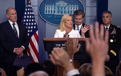 US Homeland Security Secretary Kirsten Nielsen (C) speaks during a press briefing on national security with Director of National Intelligence Dan Coats (L), FBI Director Christopher Wray (2nd R) and Gen. Paul Nakasone (R), commander of the US Cyber Command (R) at the White House in Washington, DC, on August 2, 2018. (AFP/Nicholas Kamm)
