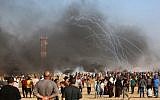 Palestinian protesters at the Israel-Gaza border, in Khan Yunis in the southern Gaza Strip, on August 3, 2018. (AFP/Said Khatib)