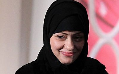 In this file photo taken on March 8, 2012  political activist Samar Badawi of Saudi Arabia is presented with an International Women of Courage Award by the US Secretary of State and the first lady during a ceremony at the State Department in Washington, DC. (AFP PHOTO / GETTY IMAGES NORTH AMERICA / ALEX WONG)