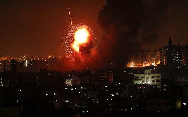 A picture taken on August 8, 2018 shows a fireball exploding during Israeli air strikes in Gaza City. (AFP PHOTO / MAHMUD HAMS)